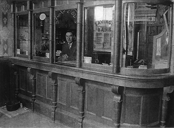 Arthur Tracy at teller window